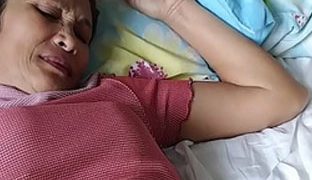 Heisse asiatische alte Frau
